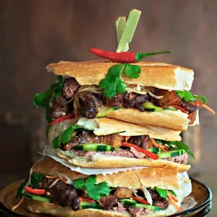 a stack of sandwiches on a plate