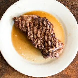 a piece of steak on a plate