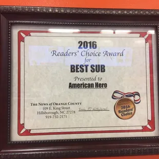 a framed award for readers choice award