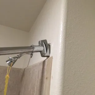Broke curtain pole.