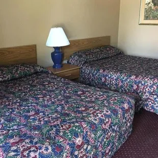 Picture of our two bed remodeled room after rebranding from American Inn to The Inn Council Bluffs