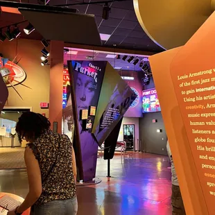 a woman playing a piano