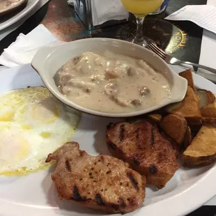 Sunday morning,Pork chops and eggs and mimosas.... delicious!