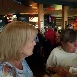two women sitting at a table