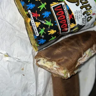 a bag of chips and a sandwich