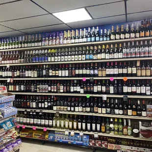 rows of wine bottles on shelves