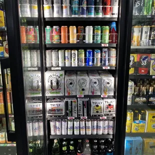 a refrigerator full of cans of beer