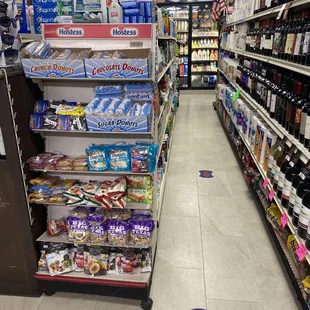 a grocery store aisle filled with products