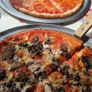 a pizza with mushrooms and cheese