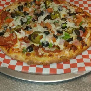 Garbage pizza, plus jalapenos