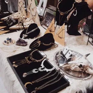 My trunk show display showcase at House of Aria /// American retail supply: Low Necklace busts and jewelry case with velvet pad