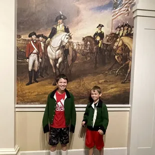 Kids can try on different Revolutionary War jackets.