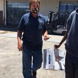 Mr. H. Coming to cut handle holes in a box