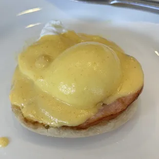a plate of eggs benedict