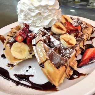 Amazing Nutella Belgium waffle with strawberries and bananas