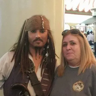 a man and a woman dressed as pirates
