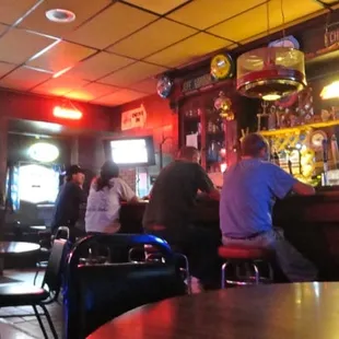 people sitting at the bar
