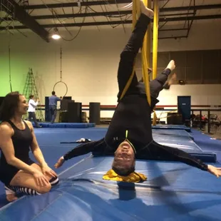 LEEB hangs around from satin ribbon.