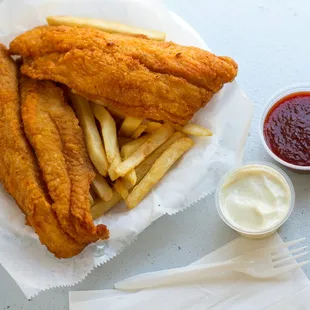a basket of fish and fries