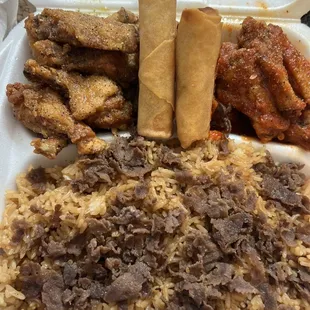 a plate of food in a styrofoam container