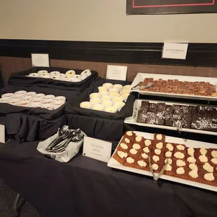 a table of desserts and pastries