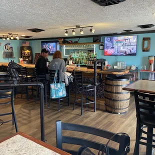 View of the bar. Very open and inviting. Children are allowed in the restaurant, but not beyond the bar railing.