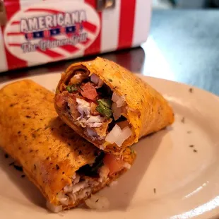 Bluegill fish wraps are the new crave. Served with a drizzle of Americana&apos;s Famous Ranch dressing.