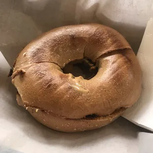 Whole wheat bagel with melted peanut butter!