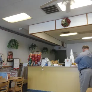 a man standing at the counter