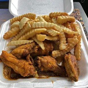 Honey Old Bay Wings and fries both fried hard/well done