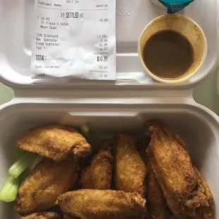 Moon dust wings, moon dust seasoning, ranch dressing and my receipt. I got 10% off with a coupon on the back of my Giant food receipt.
