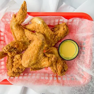 Whole Wings breaded and deep fried, then seasoned with Cajun or any other flavor of your liking!