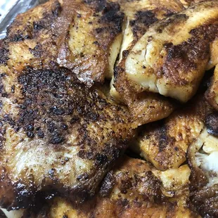 20-piece Grilled Tilapia, Cajun Style (on a bed of dirty rice!!!)