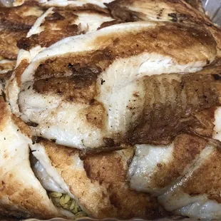 20-piece Grilled Tilapia Special (the tilapia sits on a bed of dirty rice!!!)