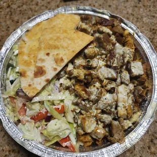 Chicken &amp; Lamb over rice with lettuce/tomato/red onion/cucumber &amp; white  sauce