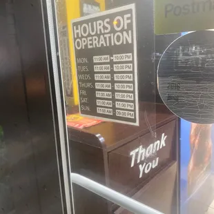 a sign in the window of a restaurant