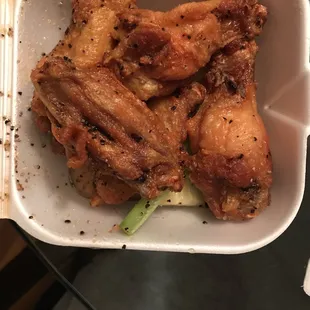 chicken wings in a styrofoam container