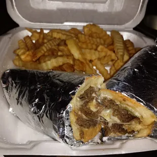 Steak and cheese with French fries