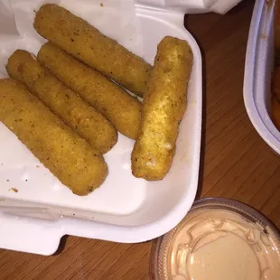 Cheese sticks (minus 1) with shrimp sauce!