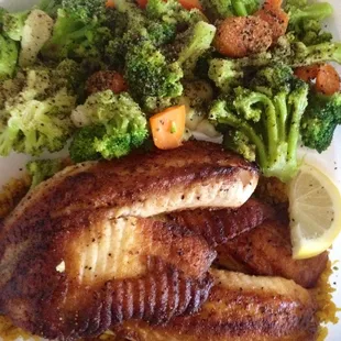 Grilled tilapia with veggies over rice