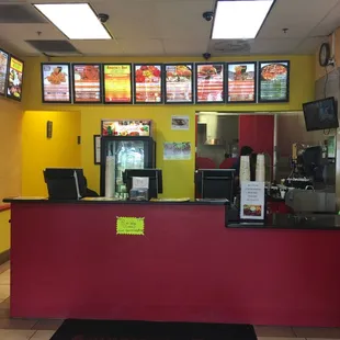 Counter and menu boards on wall