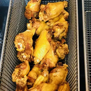 two baskets of fried chicken