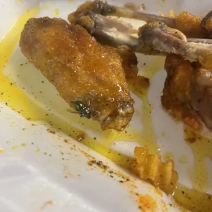 Chicken with a fly on it from America's best wings!