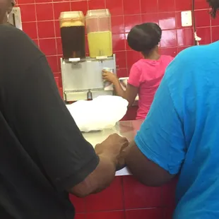 two people in a kitchen