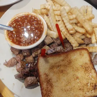 Steak tips and fries with beans