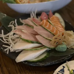 Sashimi platter - salmon, albacore, butter fish, snapper, hamachi and another.