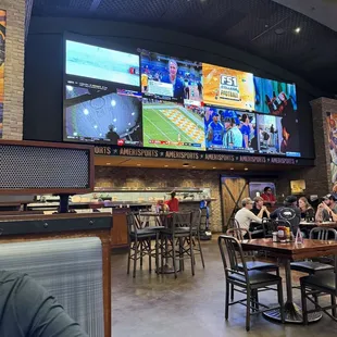 a baseball game being played on a big screen