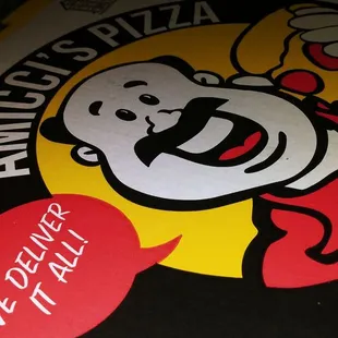 a pizza with a smiley face