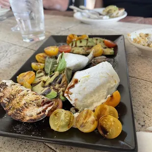Avocado burrata caprese salad