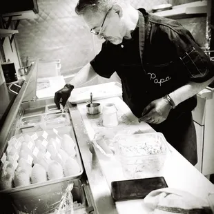 Alfie the owner making Arancinis